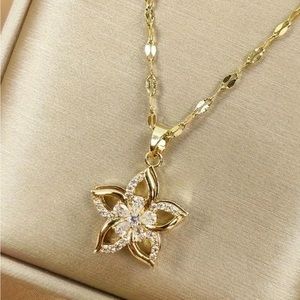 🌼 Golden Stainless Steel Rotating Hollow Flower Pendant Necklace